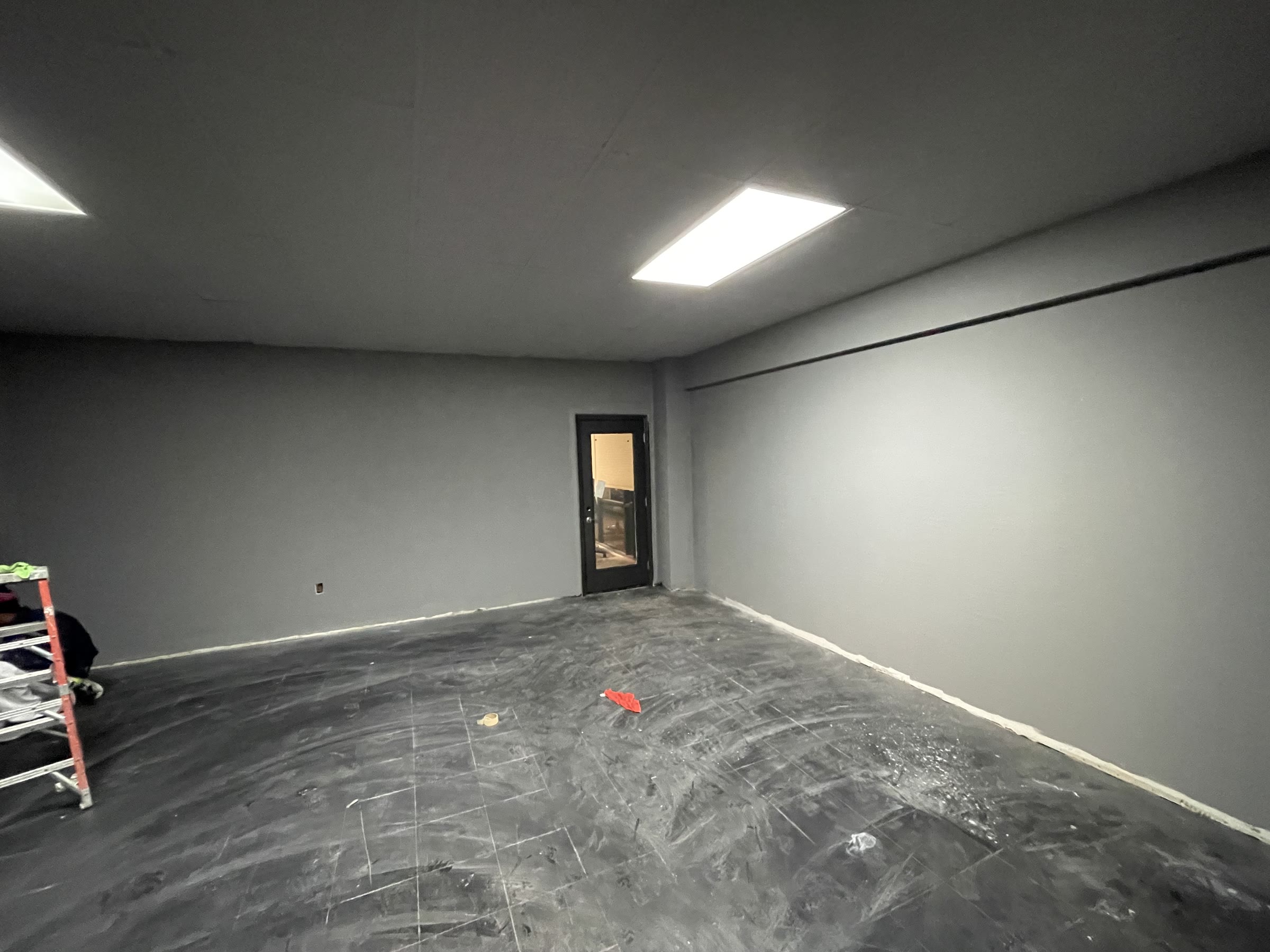 Wide view of the future PHP studio during interior construction
